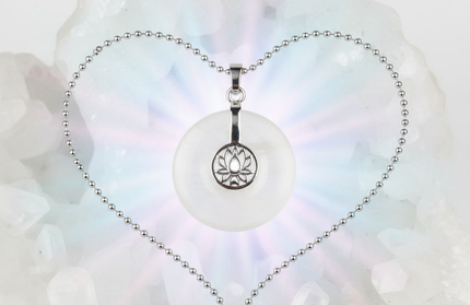 Clear Quartz lotus pendant necklace on silver chain – healing crystal jewelry for meditation and spiritual alignment.
