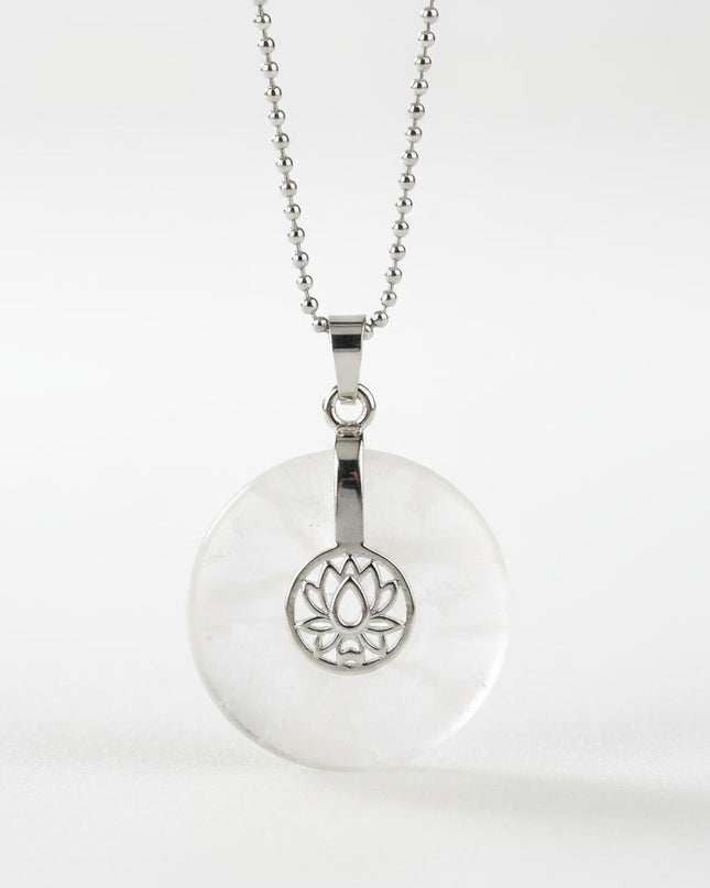 Clear Quartz lotus pendant necklace on silver chain – healing crystal jewelry for meditation and spiritual alignment.