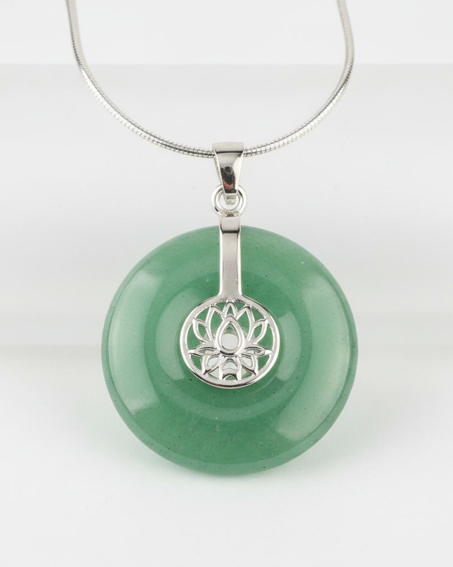 Green Aventurine lotus pendant necklace on silver chain – healing crystal jewelry for meditation and spiritual alignment.