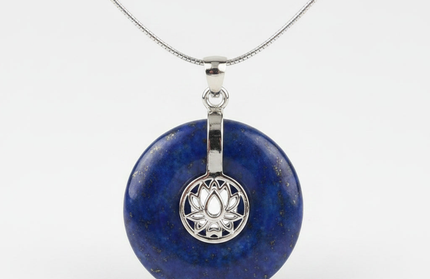 Lapis Lazuli lotus pendant necklace on silver chain – healing crystal jewelry for meditation and spiritual alignment.