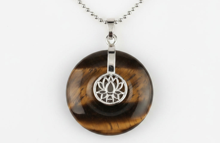 Tiger Eye lotus pendant necklace on silver chain – healing crystal jewelry for meditation and spiritual alignment.
